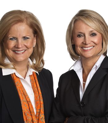 Portrait of Lee Stratton & Debbie Momberg, REALTOR®.
